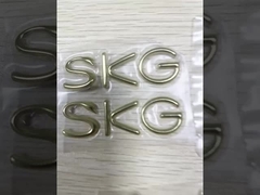 Niestandardowa srebrno-złota termotransferowa etykieta TPU z wytłoczonym logo 3D do koszulki